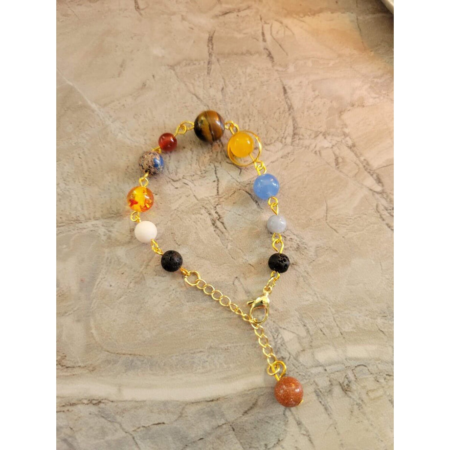 Navratna Gemstone Bracelet - To harness the beneficial energy of our nine  planets - Engineered to Heal²